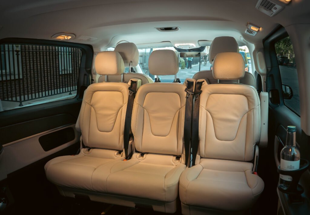 V-Class Mercedes 7 seater interior supplied with complimentary water and charger by VIP Mayfair