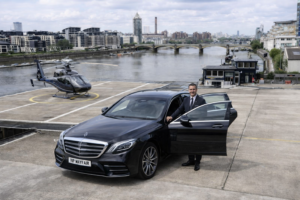 VIP Mayfair chauffeur waiting at the London Heliport Battersea for client's arrival