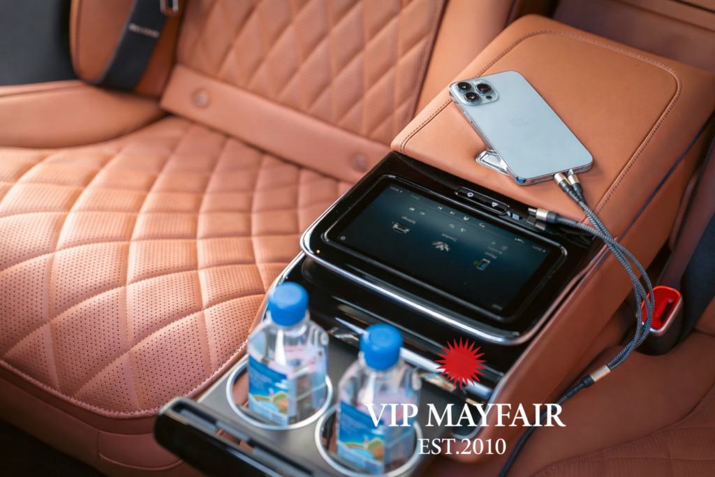 Luxury Mercedes S-Class interior by VIP Mayfair featuring premium leather seating, ambient lighting and complimentary water for private chauffeur tours from London.