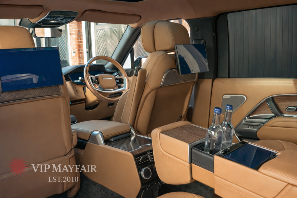 Luxury Range Rover interior by VIP Mayfair, featuring premium leather seats, refined cabin styling and a spacious rear passenger experience for disposal hire in London.